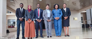 Ombudsman Malera with staff outside of the Parliament