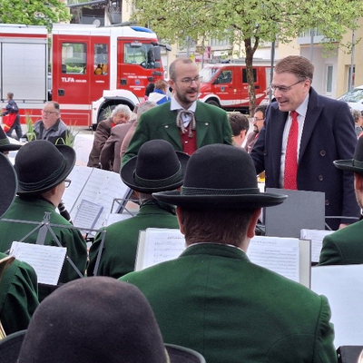 IOI President Chris Field PSM, conducting a large band in rendition of the Josef Niggas March