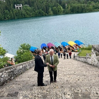 IOI President, Chris Field PSM, and former Mayor of the Lake Bled region, in front of Lake Bled