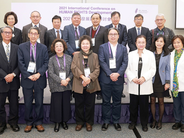 NHRC Chairperson Chen Chu (fifth from right), seminar chairs, speakers,  and other participants