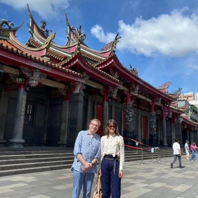 President Field and Chief of Staff Rebecca Poole outside the Hsing Tian Kong temple